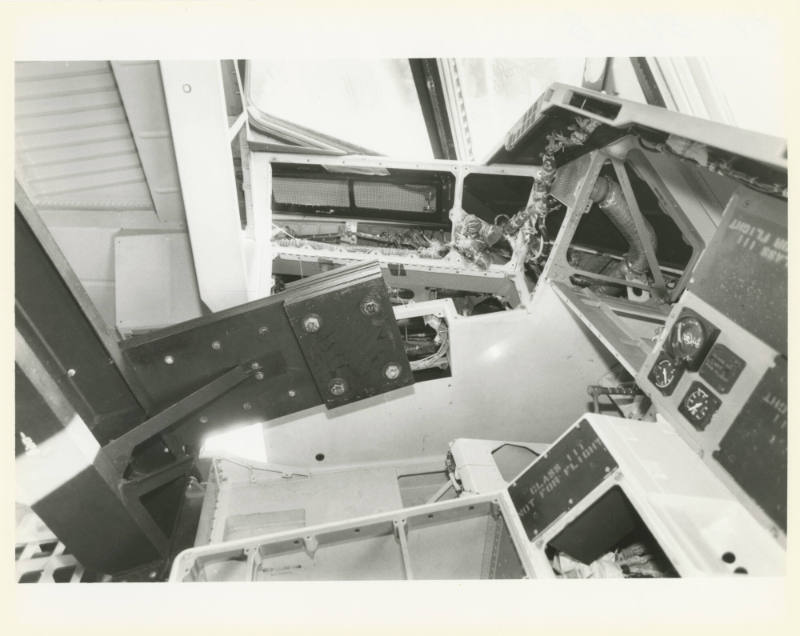 Printed black and white photograph of space shuttle Enterprise's cockpit with instruments remov…