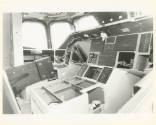 Printed black and white photograph of space shuttle Enterprise's cockpit with instruments remov…