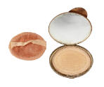 Oval shaped makeup compact on the right open to show mirror and powder inside, pink fabric appl…