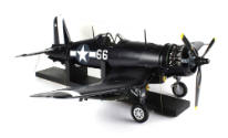 Angled side view of F4U Corsair model airplane, propeller visible at right