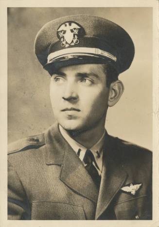 Black and white portrait of U.S. Navy pilot Edward Ritter in an aviation working green uniform