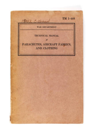 Brown manual titled "Parachutes, Aircraft Fabrics, and Clothing" dated January 10, 1941