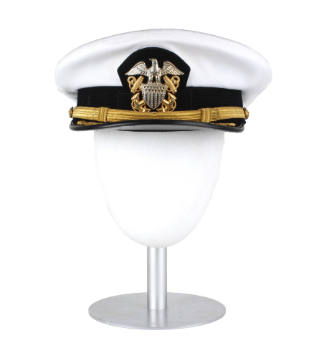 Front view of U.S. Navy officer combination cap with white cover and U.S. Navy Officer insignia…