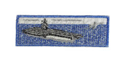 Back of blue liberty cuff patch depicting an aircraft carrier at sea with an airplane flying of…