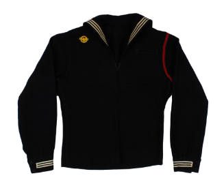 U.S. Navy dress blue jumper with Honorable Service patch and red fireman band around the left s…