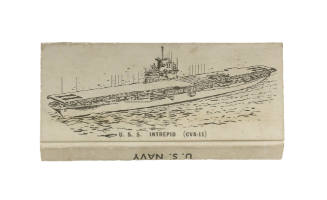 Front of recommissioning matchbook box with image of the aircraft carrier USS Intrepid at sea