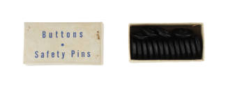 Seventeen loose blue buttons stored in original white cardboard box